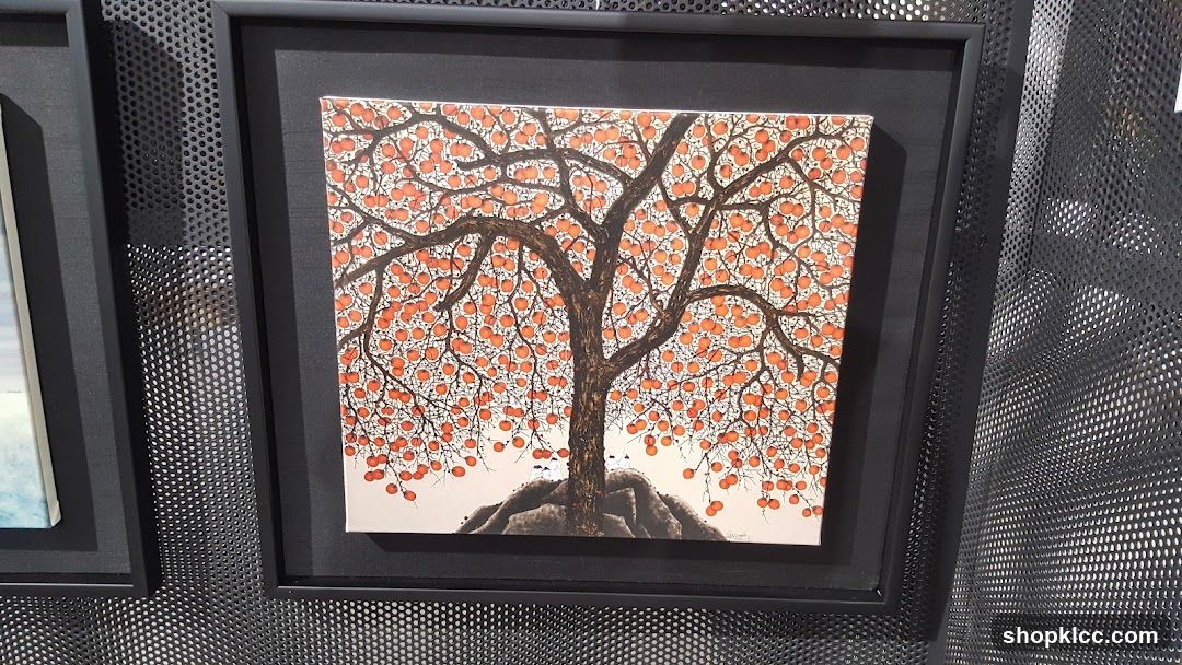 Painting of a tree with orange fruits