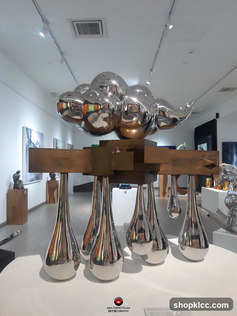 Sculpture of a cloud with teardrops