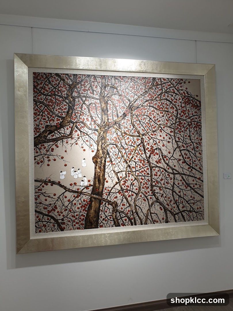 Painting of a tree with red fruit