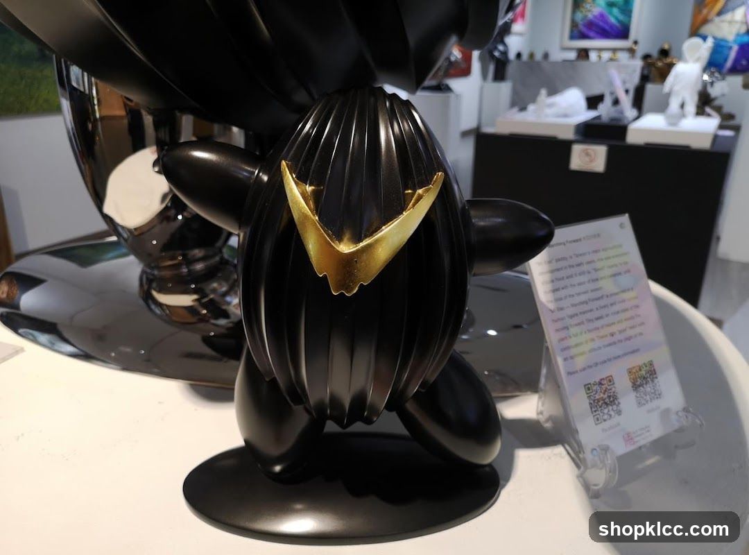 Black Sculpture with Gold Accent