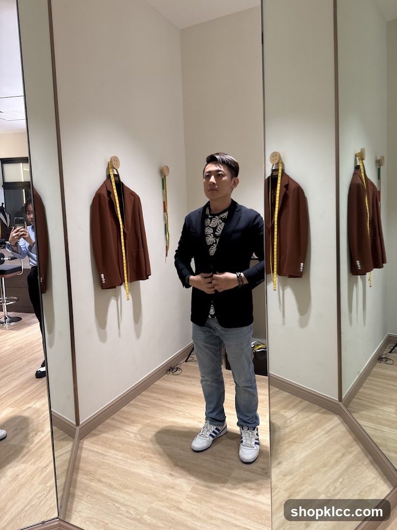 Man trying on a suit jacket
