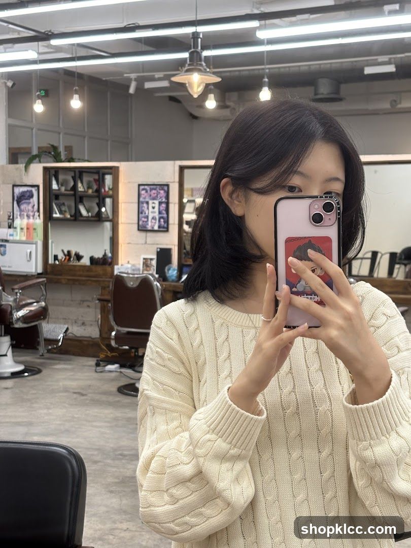 Woman taking a selfie in a salon