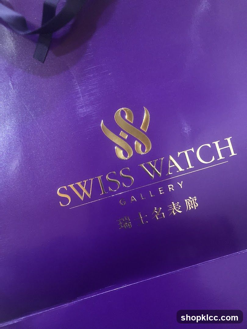 Purple Gift Bag with Gold Logo