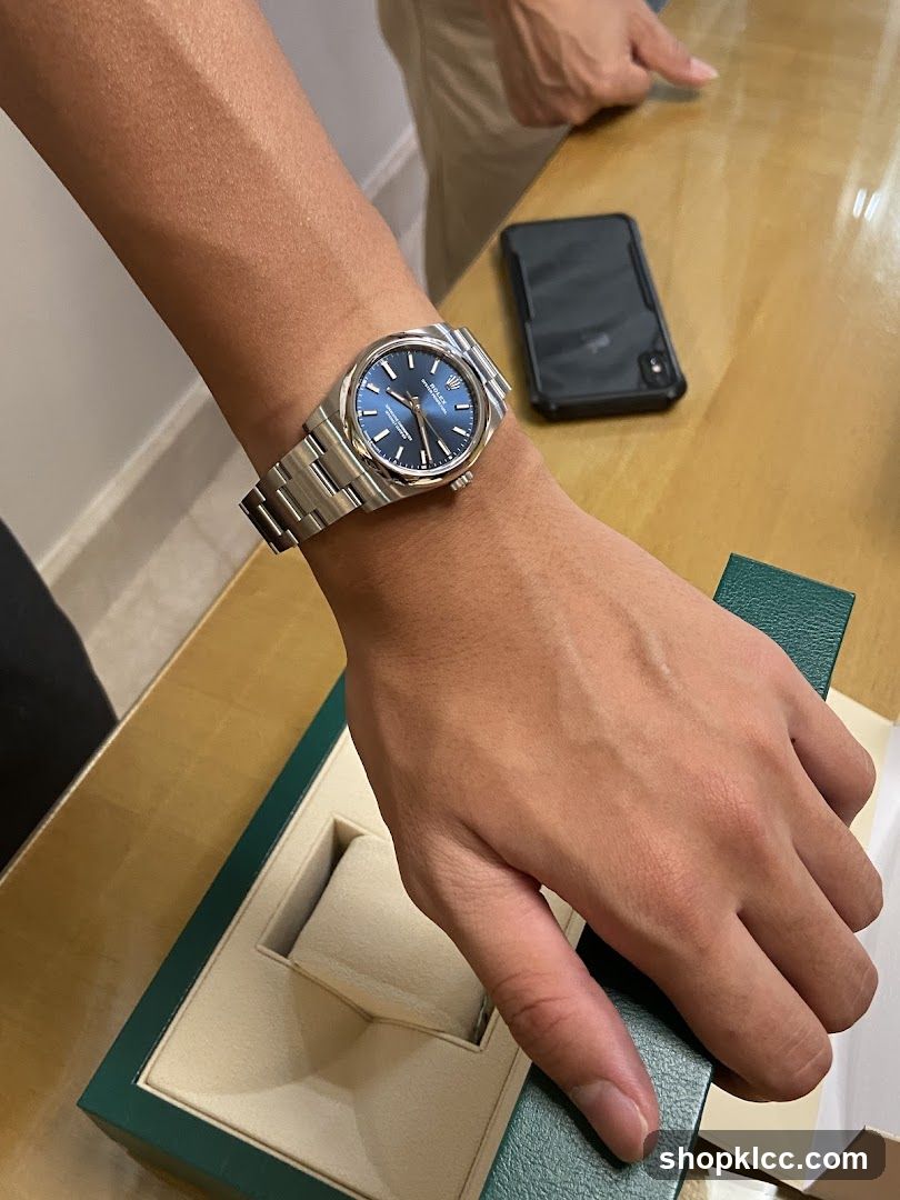 Person wearing a Rolex watch