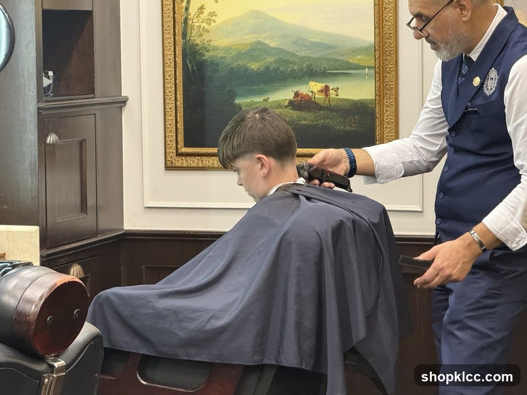 Barber cutting client's hair