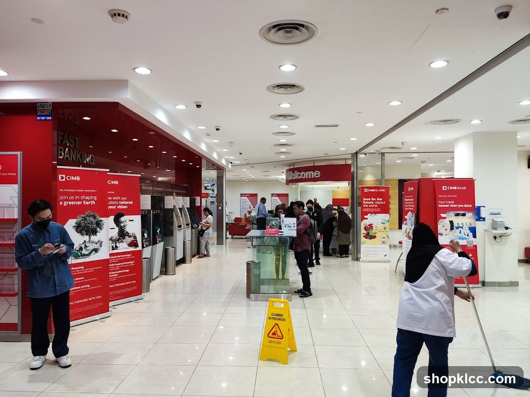Bank Interior with ATMs and Customers