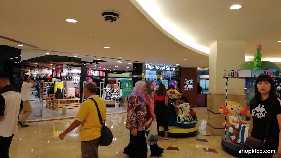 Mall Interior with Shops and People
