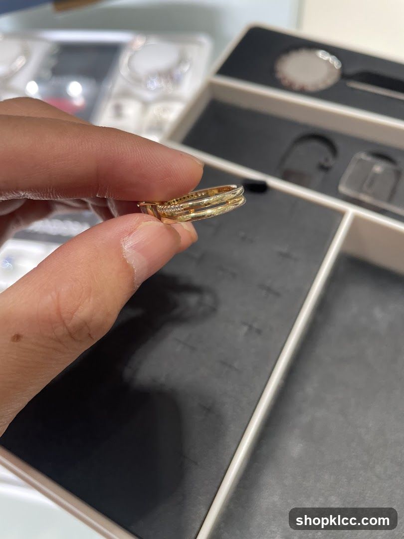 Close-up of a gold ring with small diamonds