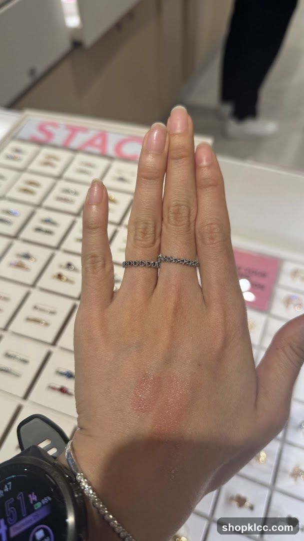 Woman's hand with rings in jewelry store