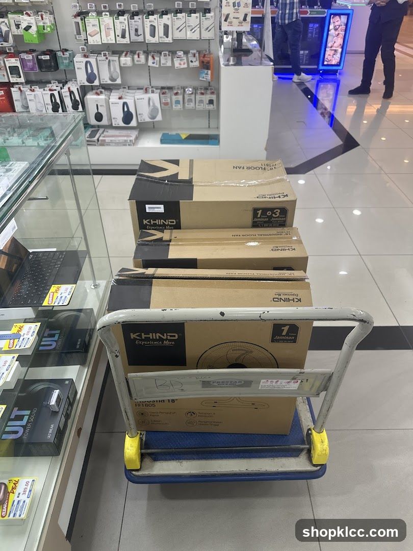 Boxes of fans on a trolley