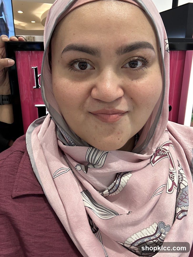 Woman in Hijab and Maroon Shirt