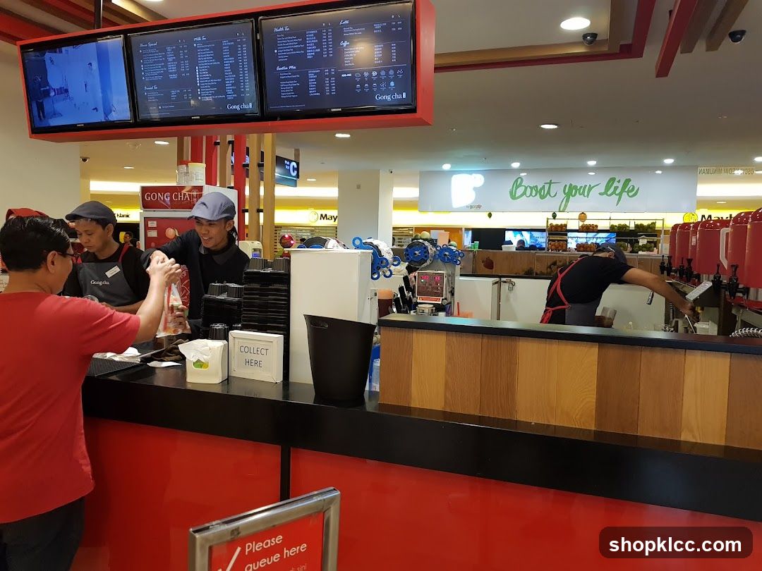 Gong Cha Staff Preparing Drinks