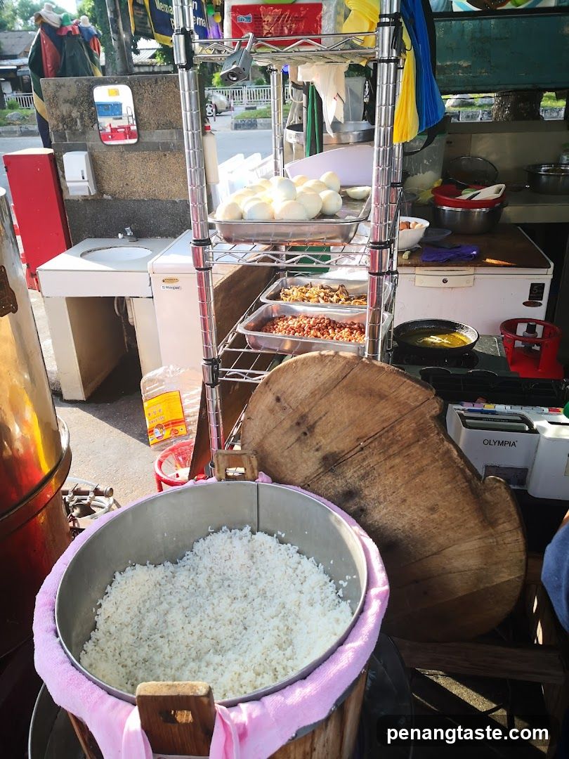 Street food stall with rice and boiled eggs