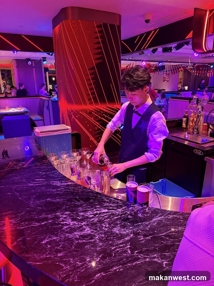 Bartender preparing drinks at a bar