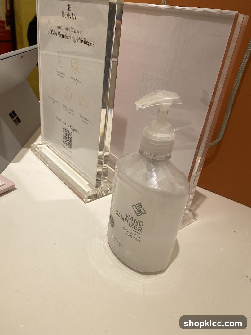 BONIA Membership Privileges Sign and Hand Sanitizer