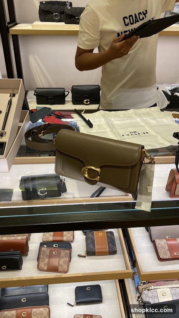 Coach Handbags and Wallets Display