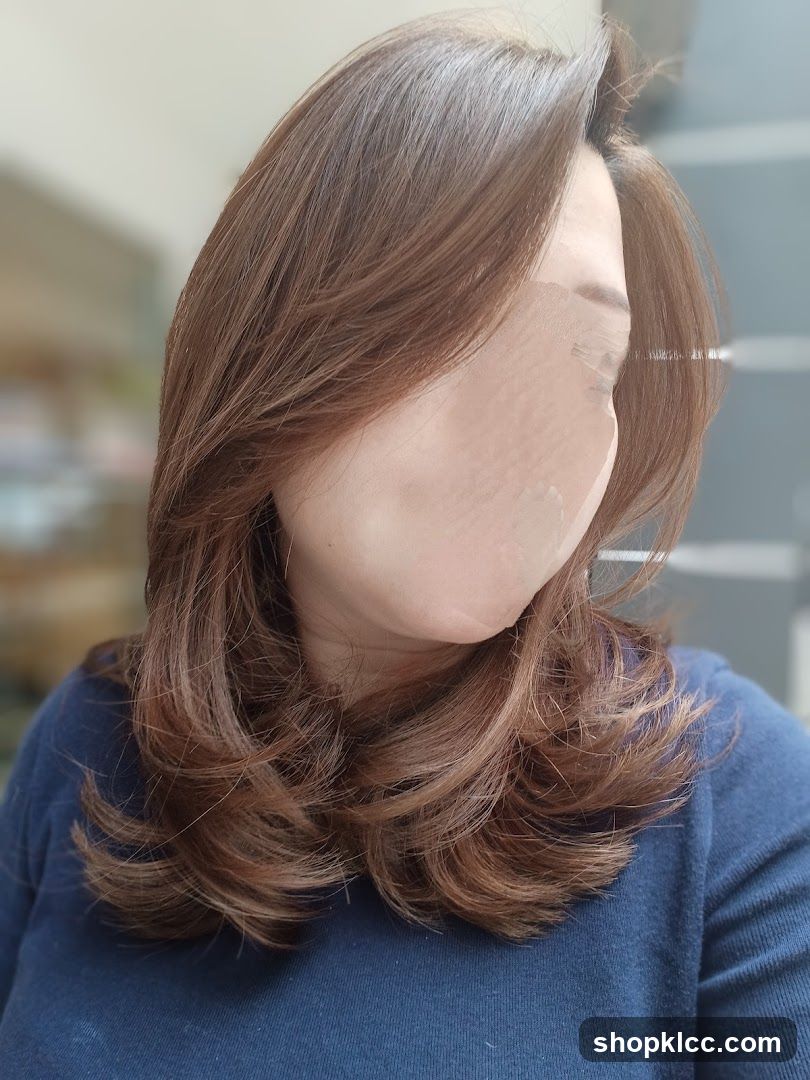 Woman with styled brown hair