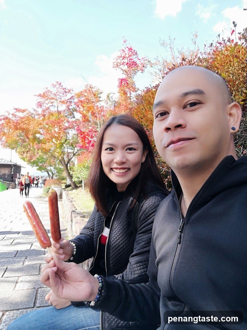 Couple enjoying snacks outdoors