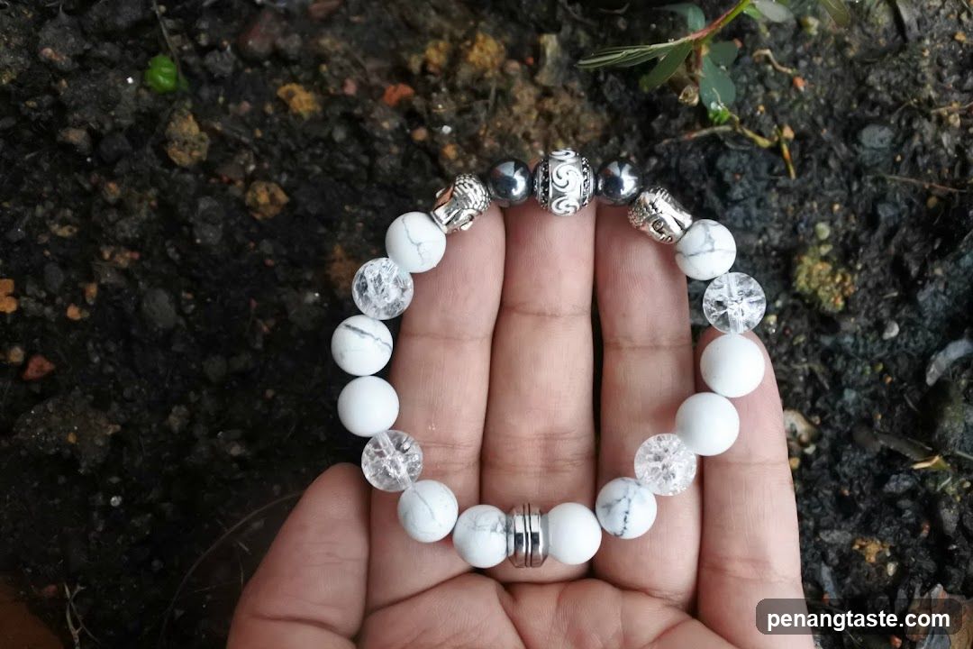 White Beaded Bracelet with Buddha Charms