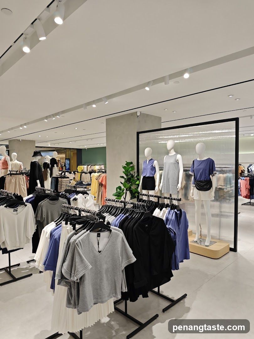Clothing store interior with mannequins and racks of clothes