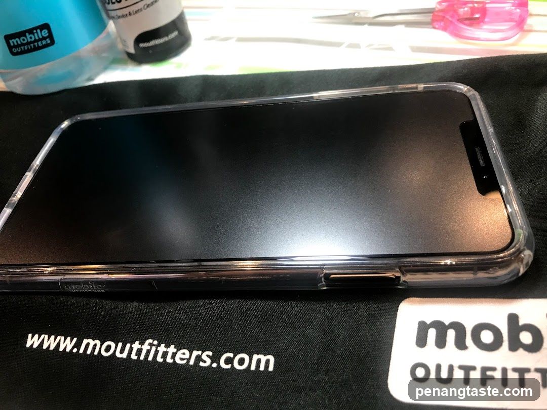 Phone with screen protector and accessories