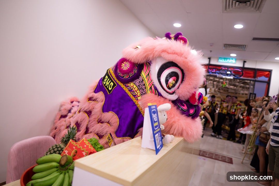 Lion Dance Performance at Shop Entrance