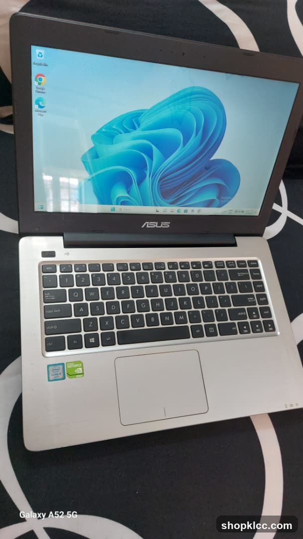 ASUS Laptop on Patterned Surface
