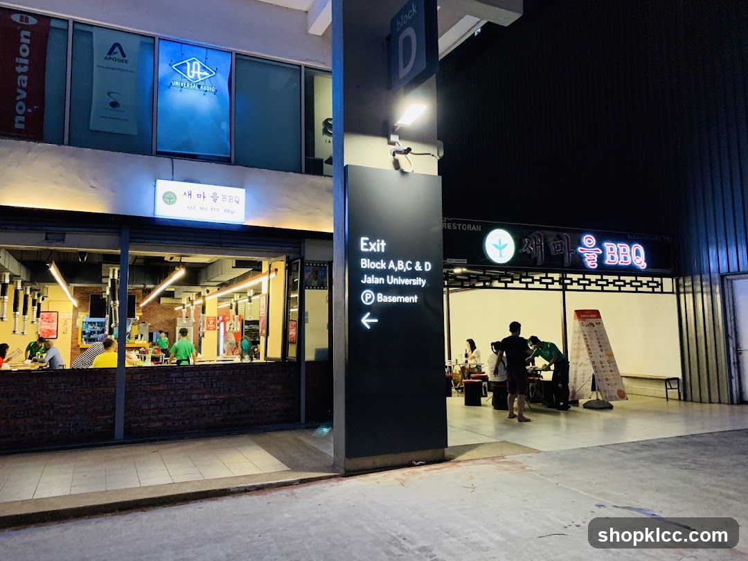 Nighttime Street View with Restaurant and Signage