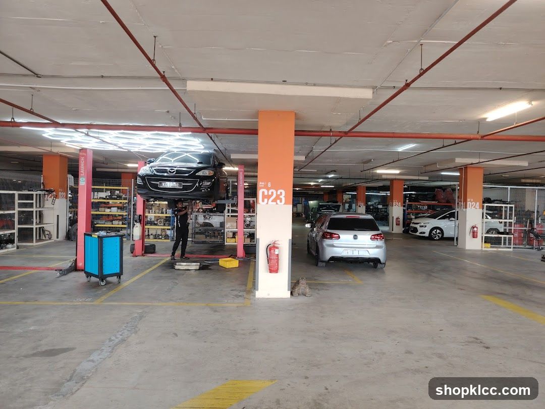 Car repair shop with vehicles being serviced