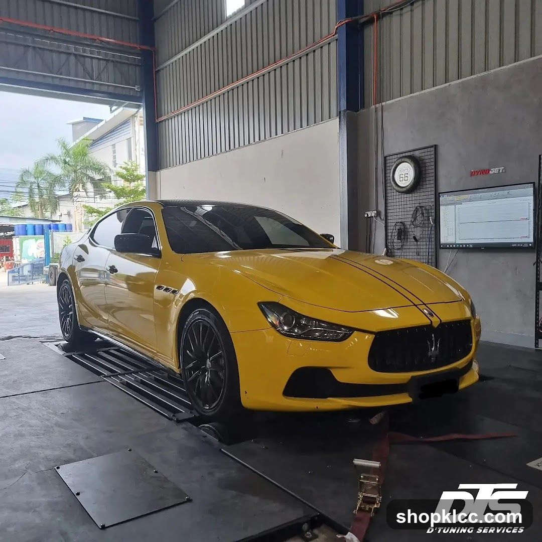 Yellow Maserati on a dynamometer