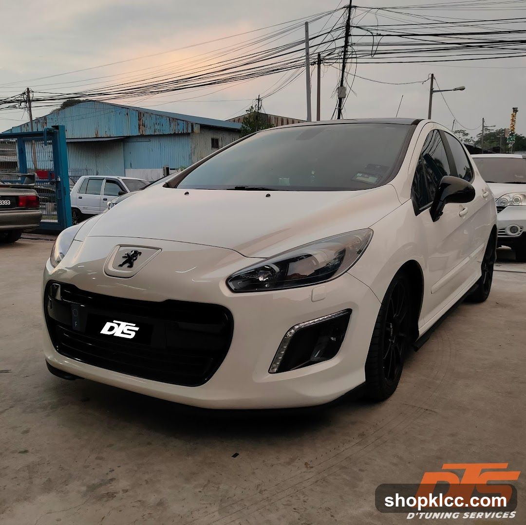 White Peugeot Car