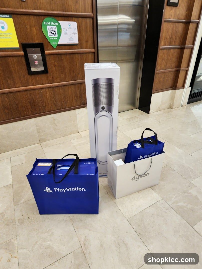 Shopping bags and a Dyson product