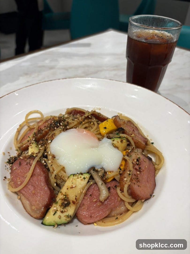 Spaghetti with Poached Egg and Sliced Meat
