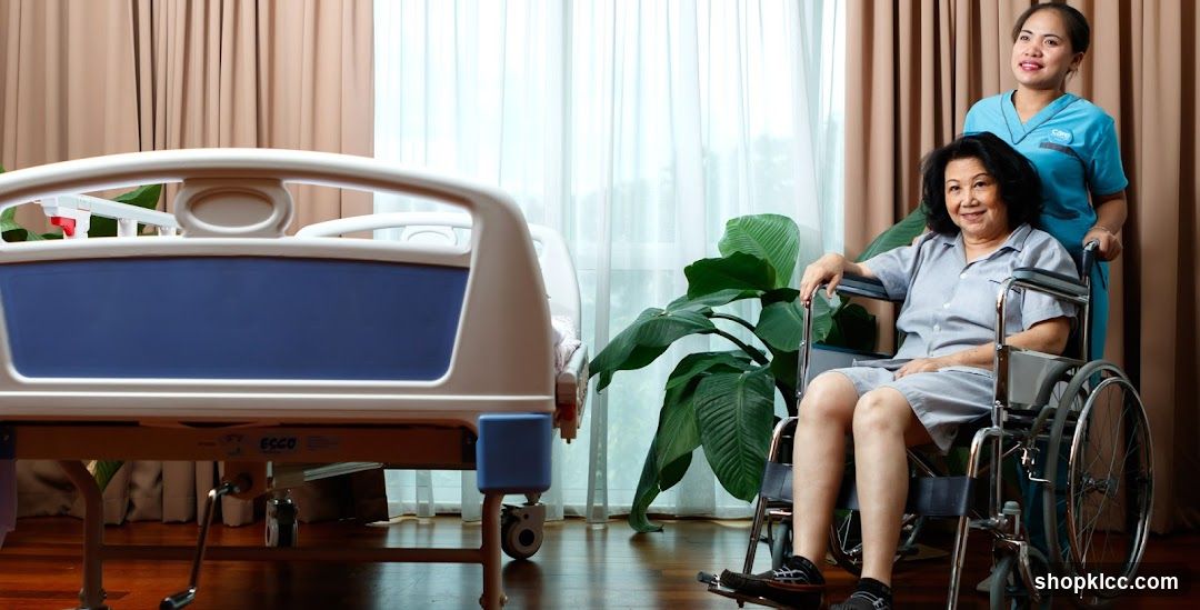 Elderly woman in wheelchair with caregiver