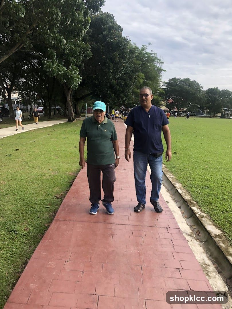 Two men walking on a path