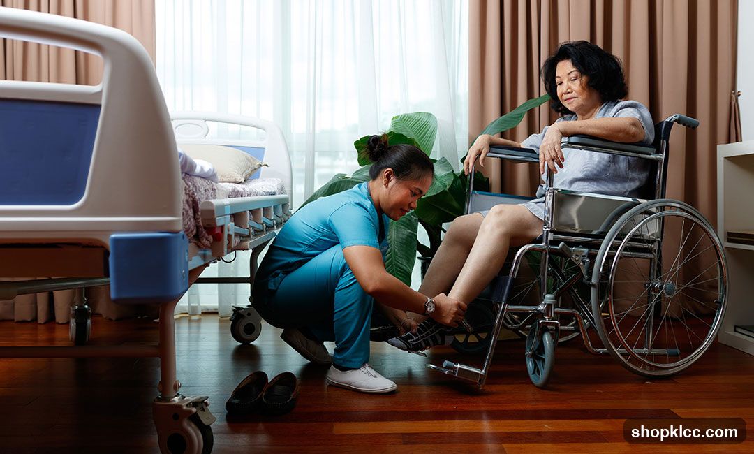 Nurse assisting patient in wheelchair