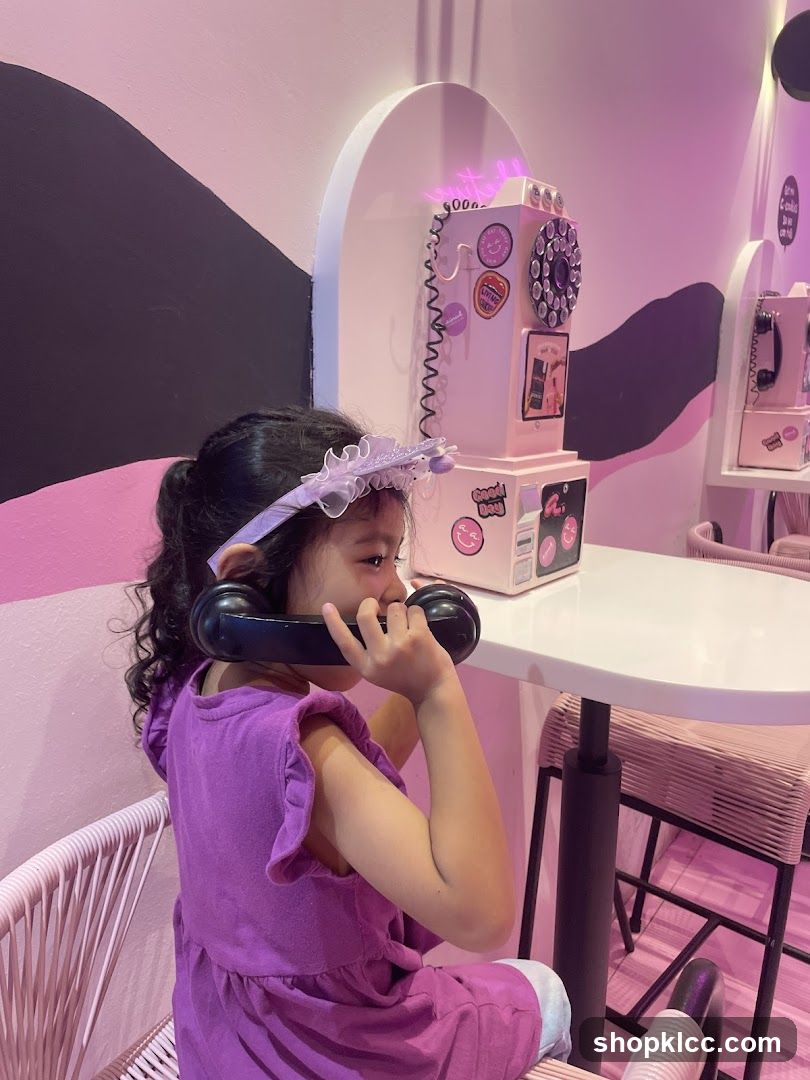 Girl on a vintage phone
