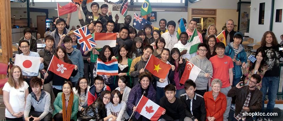Group of people holding national flags
