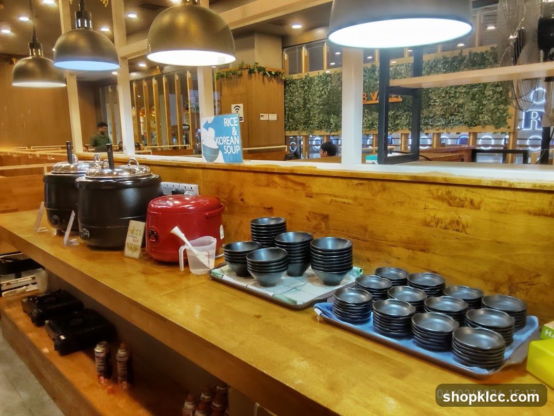 Buffet Setup with Korean Soup and Rice Station
