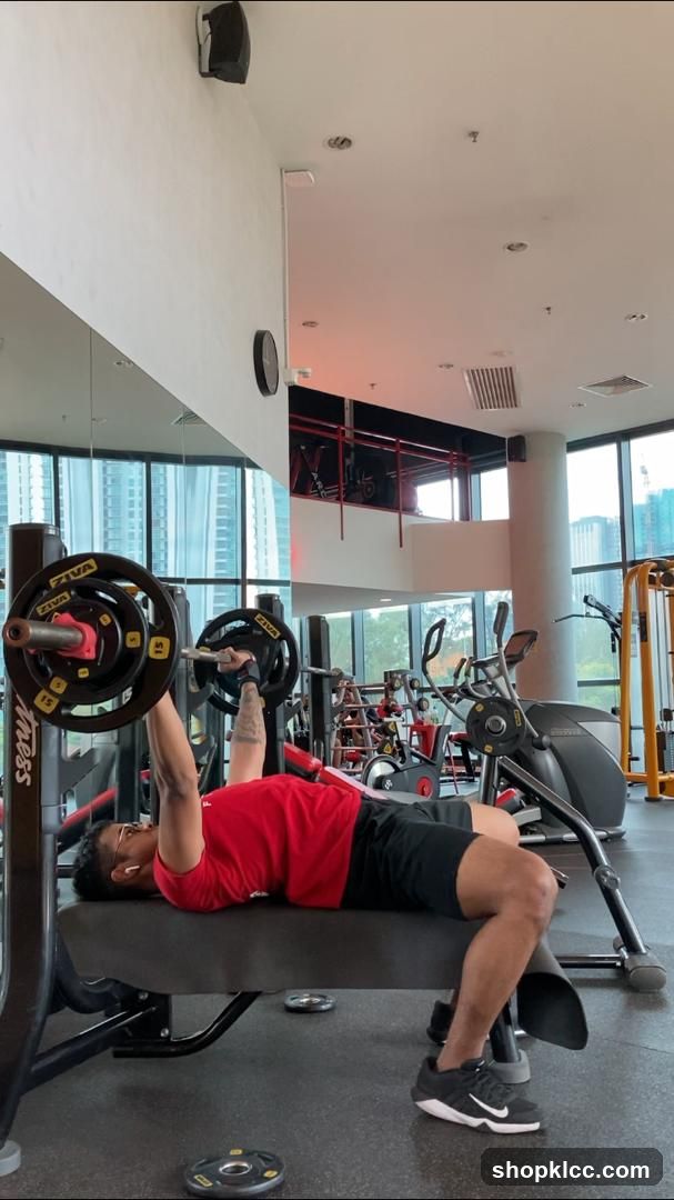 Man lifting weights in a gym