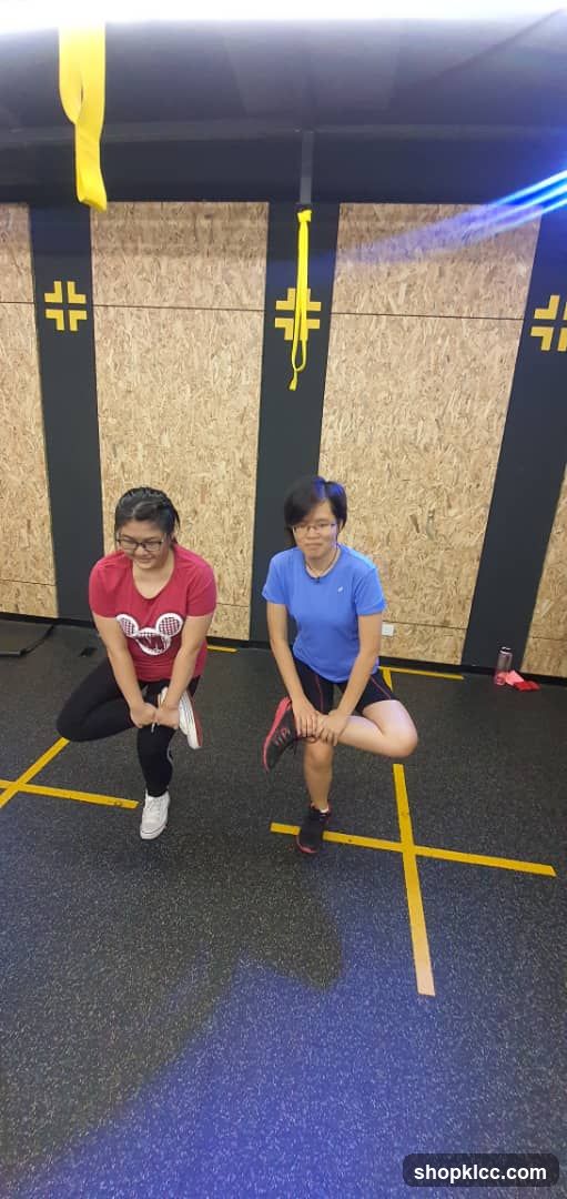 Two women exercising in a gym