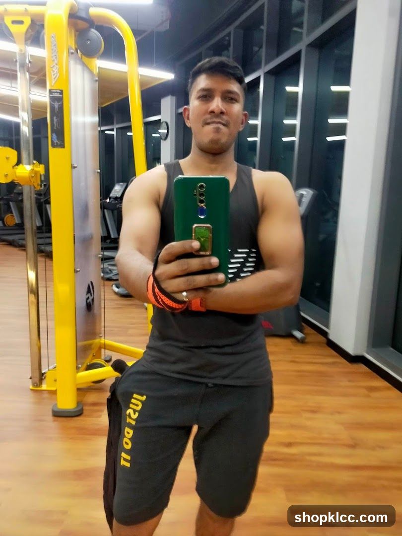 Man taking a selfie in a gym