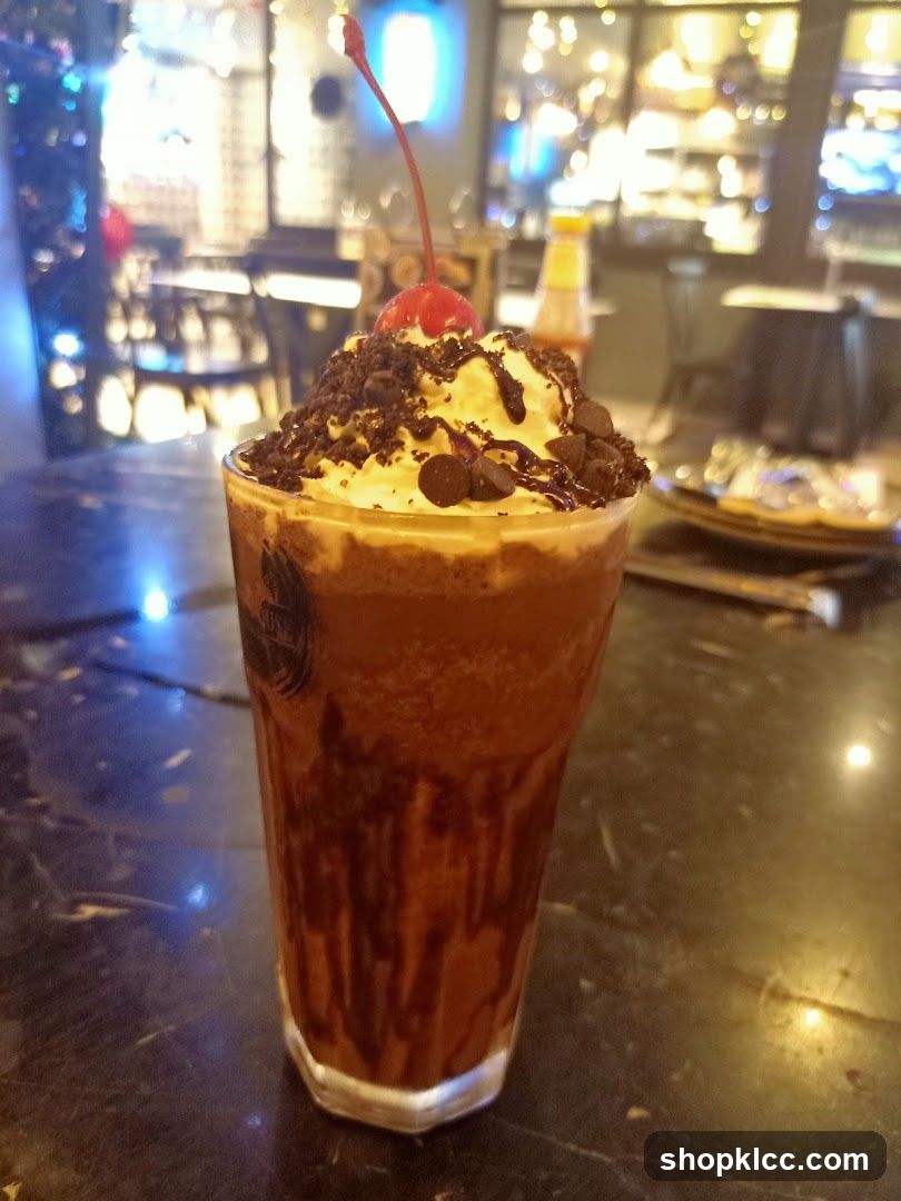 Chocolate Frappe with Whipped Cream and Cherry