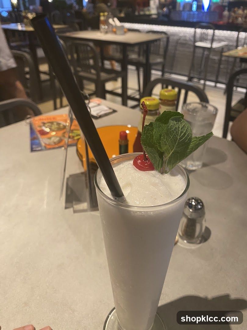 White Drink with Cherry and Mint