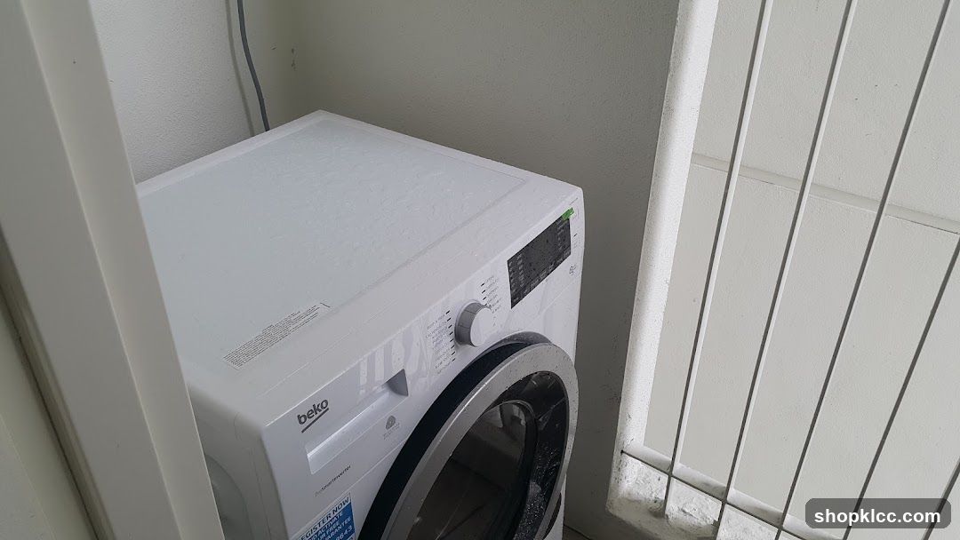 Beko Washing Machine in Corner