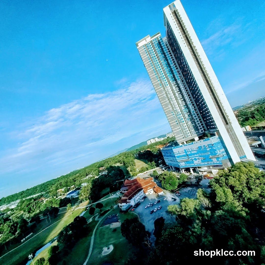 Aerial view of modern high-rise buildings and green landscape