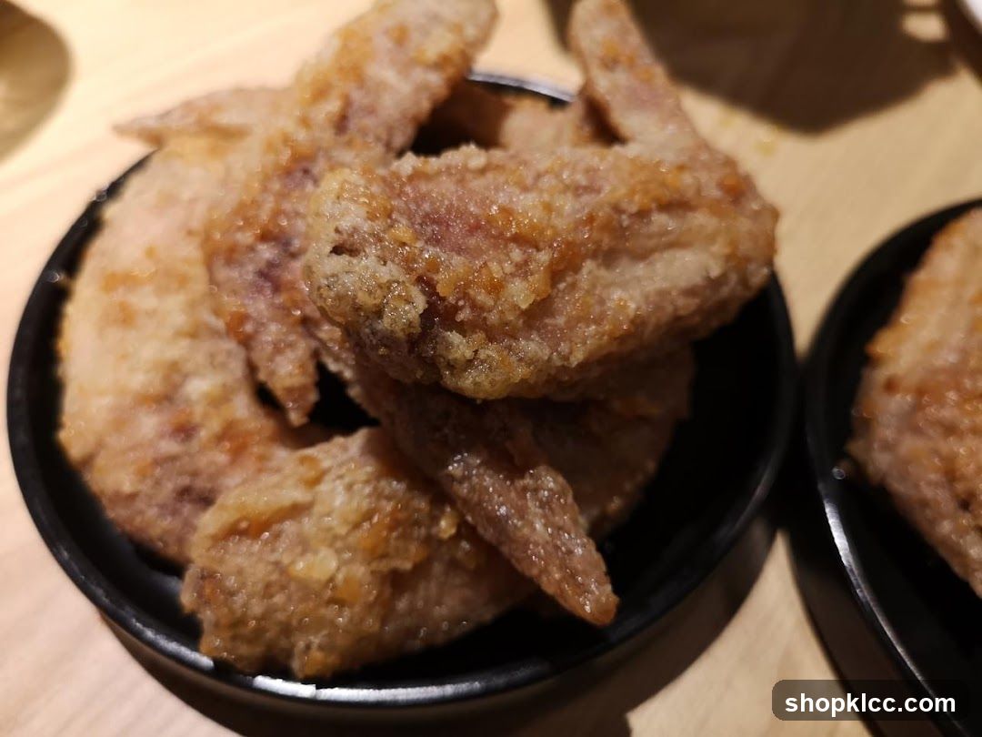 Fried Chicken Wings on Black Plate