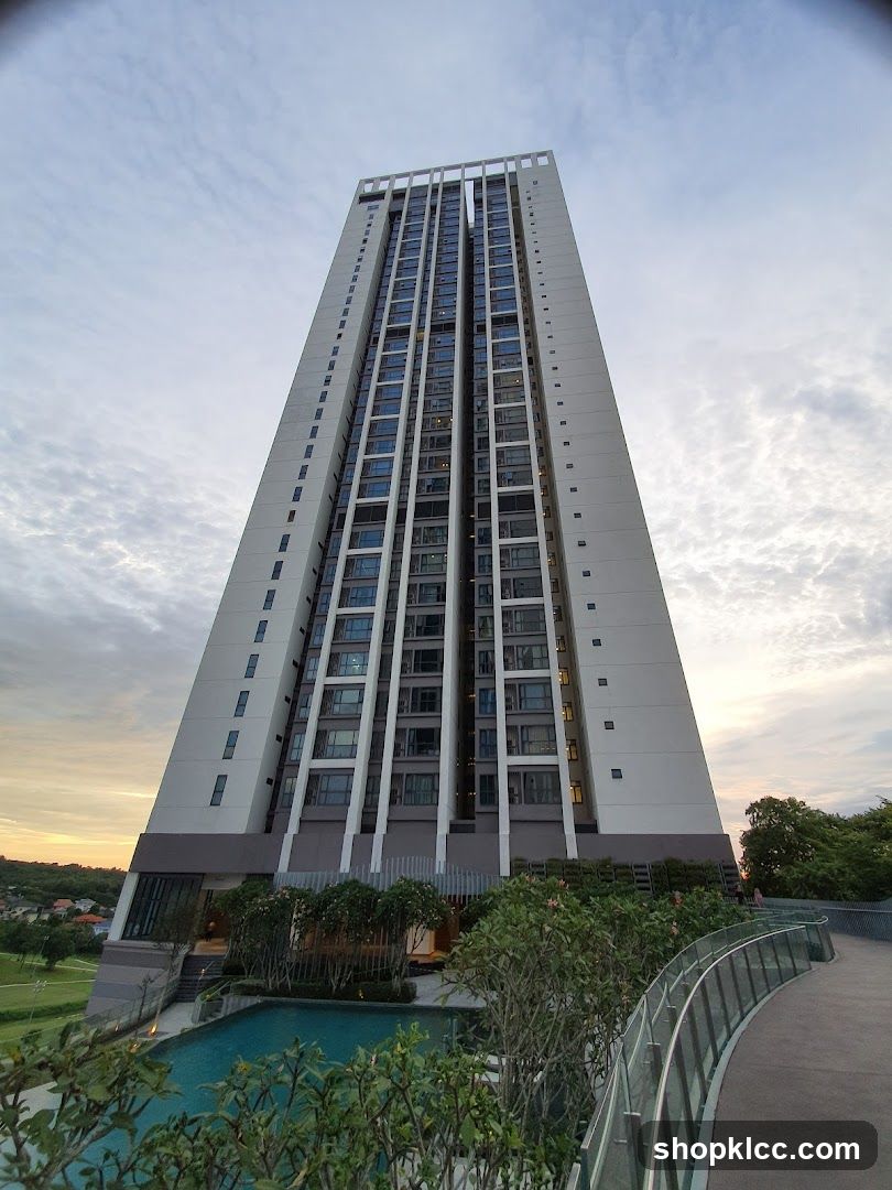 High-rise building exterior with pool area