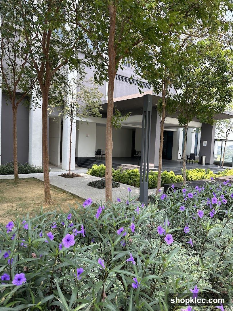 Modern Building Entrance with Purple Flowers