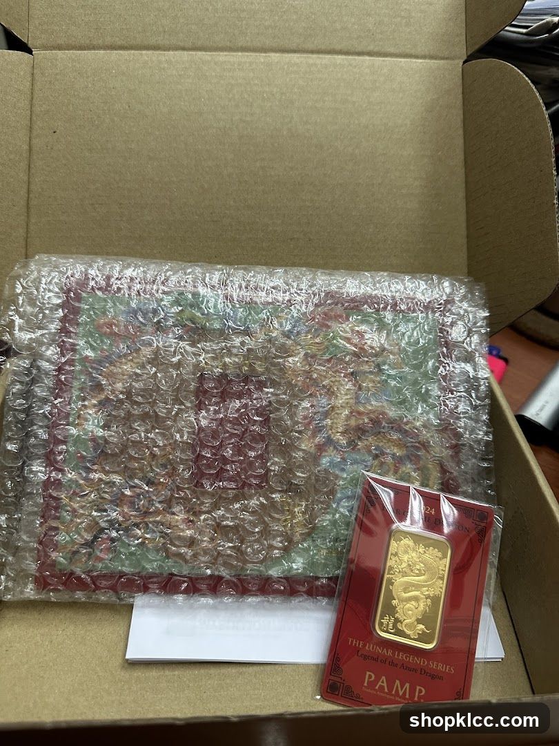 Gold Bar and Decorative Item in Box